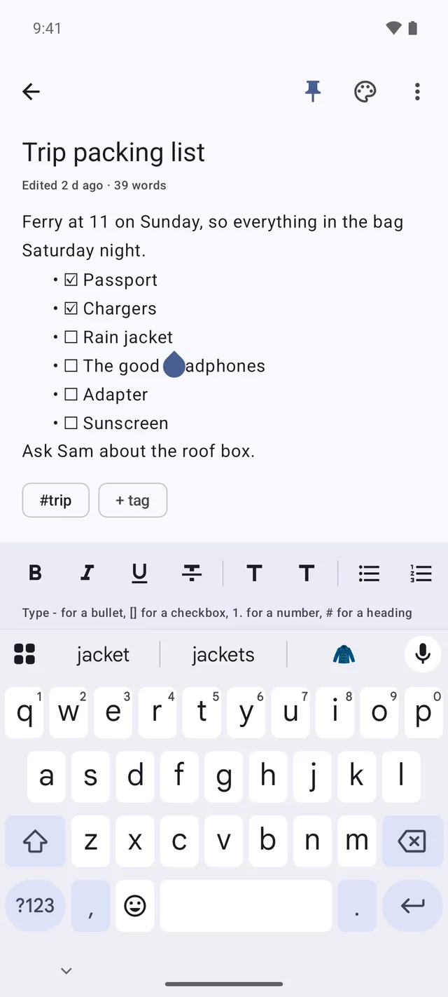 A note open in the editor, mixing a paragraph with a tickable checklist, with the formatting row above the keyboard.
